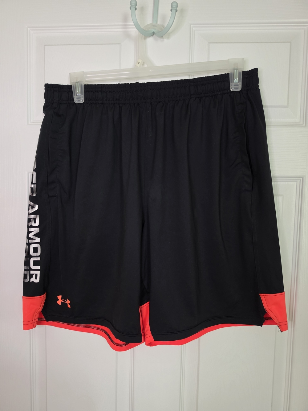 Under Armour Black Athletic Shorts with Neon Orange Accents